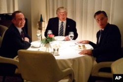 President-elect Donald Trump, center, eats dinner with Mitt Romney, right, and Trump Chief of Staff Reince Priebus at Jean-Georges restaurant, Nov. 29, 2016.