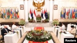 Menlu RI Retno Marsudi dan Menhan Prabowo Subianto bertemu dengan Menlu Australia Marise Payne dan Menhan Australia Peter Dutton di kantor Kemlu RI di Jakarta, 9 September 2021. (Kemenlu RI via REUTERS)