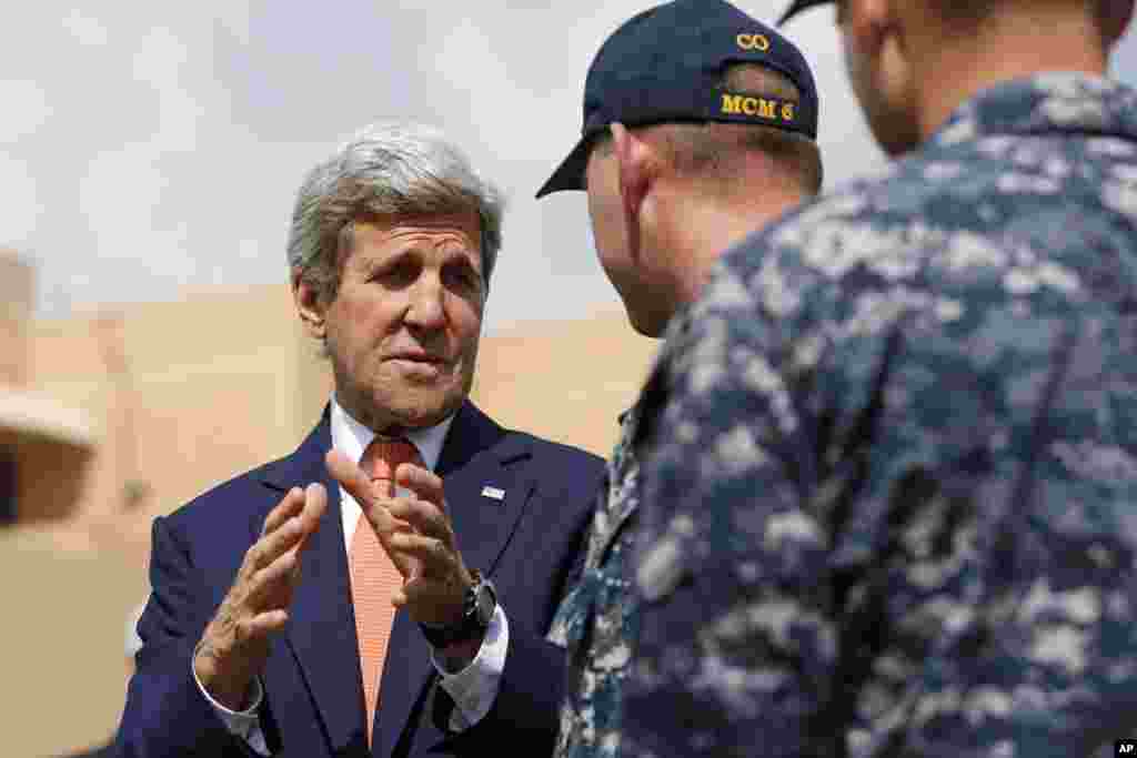 Secretary of State John Kerry meets with officers from the U.S. Navy's Fifth Fleet as he tours the Naval Support Activity Bahrain base in the Gulf, in Manama, Bahrain, Thursday, April 7, 2016.