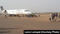 Passengers disembark at Juba International Airport, which is to undergo an overhaul funded by China's Export and Import Bank.