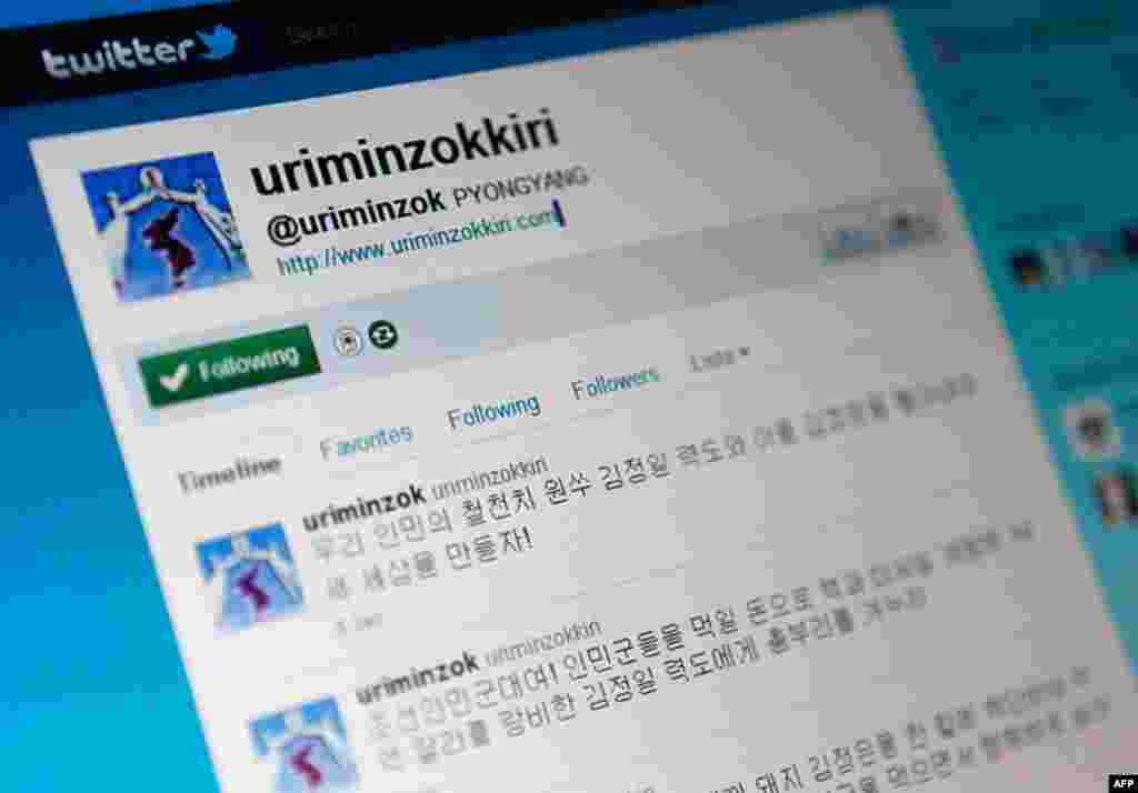 January 11: North Korea's official Twitter account page,"uriminzokkiri" meaning "by our nation", is seen on a computer screen in Seoul. Hackers have attacked North Korea's official Youtube and Twitter accounts, posting a cartoon showing Kim Jong-il's heir