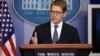 White House Press Secretary Jay Carney gestures while speaking during his daily news briefing at the White House in Washington, August, 5, 2013. 