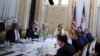 FILE - U.S. Secretary of State John Kerry (2nd R) meets with the Iranian delegation including Iranian Foreign Minister Mohammad Javad Zarif at a hotel where the Iran nuclear talks meetings are being held in Vienna, Austria, July 2, 2015.