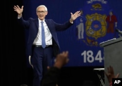FILE - Wisconsin Democratic candidate for governor Tony Evers speaks at a rally in Milwaukee, Oct. 26, 2018.