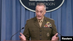 FILE - U.S. Joint Chiefs of Staff Chairman General Joseph Dunford is seen in a frame grab from U.S. Department of Defense video as he speaks to the media about the deaths of four U.S. Army special operations forces soldiers in Niger during a news conference about the attack at the Pentagon in Washington, U.S., Oct. 23, 2017. 