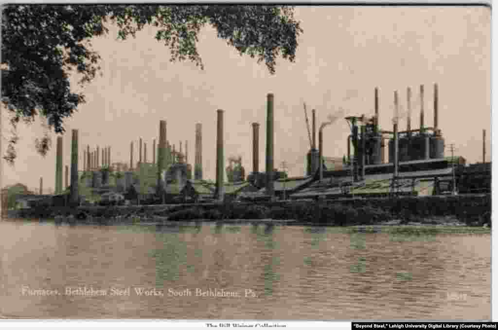 View of the Bethlehem Steel plant across the Lehigh River, South Bethlehem, Pennsylvania, sometime between 1907-1914.