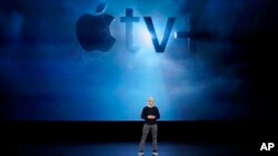 Apple CEO Tim Cook speaks at the Steve Jobs Theater during an event to announce new products Monday, March 25, 2019, in Cupertino, Calif. (AP Photo/Tony Avelar)