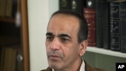 Masoud Shafii, the Iranian lawyer of three detained American hikers speaks with a Reuters correspondent at his office in Tehran, February 5, 2011.