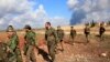 Activists: Al-Qaida Fighters Seize Two Syrian Bases
