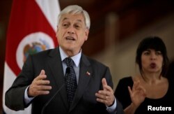 FILE - Chile's President Sebastian Pinera attends a news conference at the Presidential house in San Jose, Costa Rica, July 9, 2018.