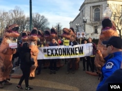 Protesters led by Greenpeace protest the Rex Tillerson confirmation hearing on Capitol Hill, Jan. 11, 2017 (K. Gypson / VOA)