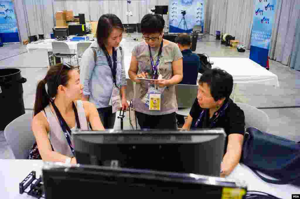 VOA Mandarin staff working hard at the RNC.