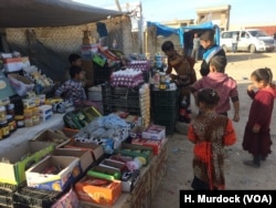 In some villages formerly held by IS, the children of militants are not welcome, no matter how young. Mothers here say they don't see a future beyond the Haj Ali camp in Northern Iraq, Dec. 27, 2017.