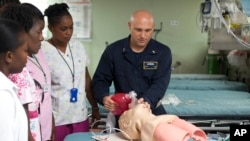 Haitian nurses receive training aboard the U.S. Navy hospital ship USNS Comfort, anchored off Port-au-Prince, Haiti, Monday, Sept. 14, 2015.