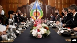 U.S. Secretary of State Antony Blinken, second right, meets with Indonesian Foreign Minister Retno Marsudi, second left, at the Pancasila Building in Jakarta on Dec. 14, 2021.