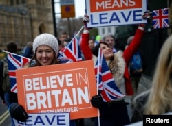 Pro-Brexit protesters demonstrate outside the Houses of Parliament, ahead of a vote on Prime Minister Theresa May's Brexit deal, in London, Britain, Jan. 15, 2019.