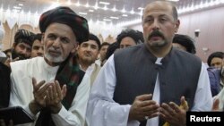 Ubijeni Hašmat Karzai (desno), rođak bivšeg avganistanskog predsednika tokom predizborne kampanje, 6. jun 2014. (arhiva)