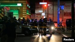 La police sur le lieu de la fusillade à Toronto, au Canada, le 22 juillet 2018. REUTERS / Chris Helgren 