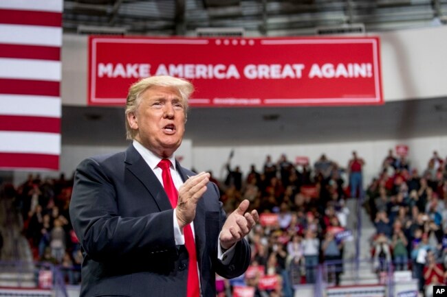 President Donald Trump arrives at a rally at Resch Center Complex in Green Bay, Wisconsin, April 27, 2019.