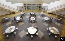 Inmates gather in the common room at the 192-bed facility at the Stanislaus County Jail in Modesto, California.
