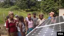 Photovoltaic cells in the solar panels, such as these in a village in Benin, convert sunlight into electricity (SELF)