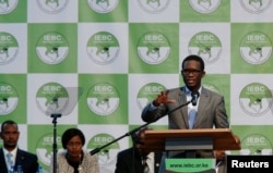 FILE - Chief Electoral Officer of Kenya's Independent Electoral and Boundaries Commission (IEBC) Ezra Chiloba speaks during a news conference ahead of the announcement of the winner of polls in Kenya's election at the Bomas of Kenya, in Nairobi, Kenya, Au