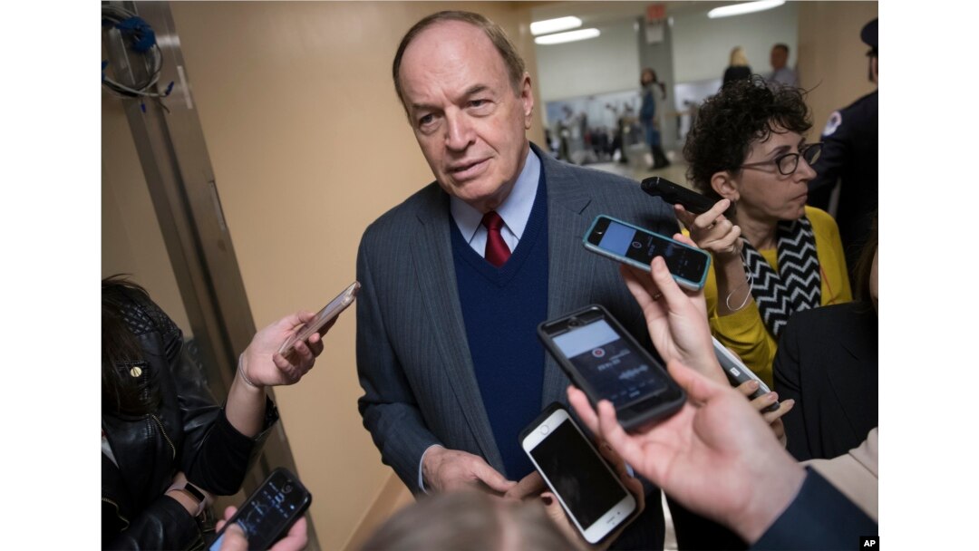 Reporters seek a comment from Sen. Richard Shelby, R-Ala., a critic of Alabama Republican Roy Moore who is running for the Senate in a special election, on Capitol Hill in Washington, Dec. 12, 2017.