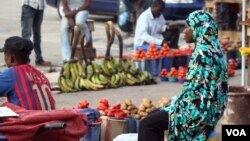 Sellers at Abuja's Utako market say they charge more for products during Ramadan because farmers charge more, Nigeria, July 2013 (Heather Murdock for VOA).