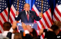 FILE - Former New York Mayor Rudy Giuliani speaks before Republican Presidential candidate Donald Trump in Youngstown, Ohio, Aug. 15, 2016.