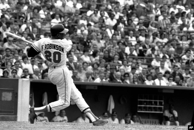 This May 19, 1966, file photo shows Baltimore Orioles' Frank Robinson at bat.