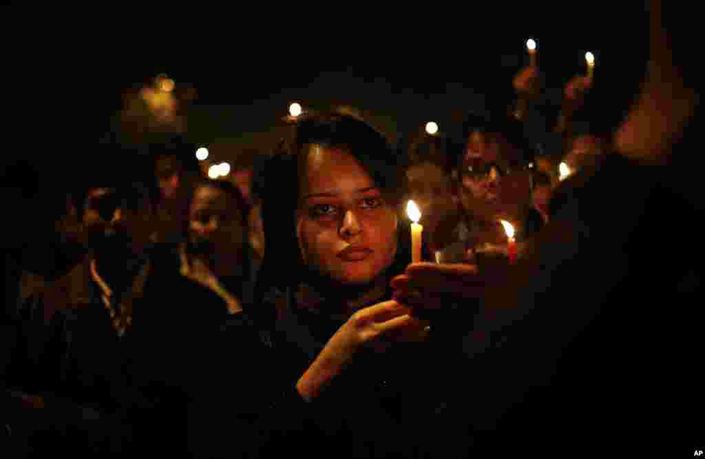 Indian women participate in a candle-lit vigil in New Delhi to mourn the death of a gang rape victim, Saturday, Dec. 29, 2012.