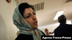 FILE - Iranian opposition rights activist Narges Mohammadi is seen at the Defenders of Human Rights Center in Tehran, Iran, June 25, 2007.