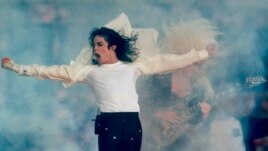 FILE - Michael Jackson performs during the halftime show at the Super Bowl XXVII in Pasadena, California, Jan. 31, 1993.