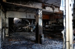 Un restaurante en el barrio de La Laguna es destruido por el fuego y la lava del volcán Cumbre Vieja, en la isla canaria de La Palma, España, 14 de diciembre de 2021.