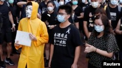 FILE - Hong Kong activist dubbed "Captain America 2.0" Ma Chun-man attends a vigil for a protester Marco Leung Ling-kit who fell to his death during a demonstration outside the Pacific Place mall, June 15, 2020. 