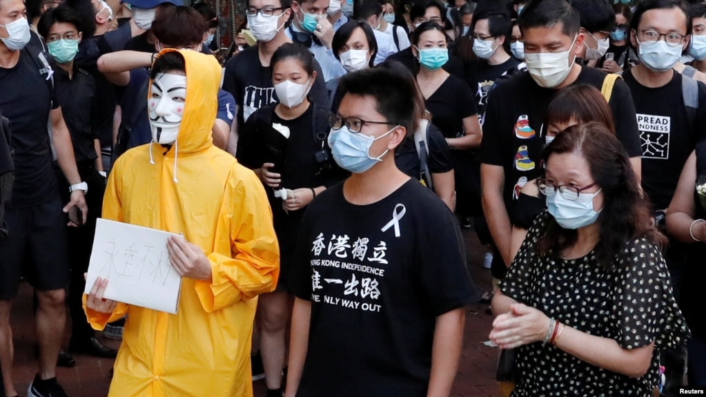 FILE - Hong Kong activist dubbed "Captain America 2.0" Ma Chun-man attends a vigil for a protester Marco Leung Ling-kit who fell to his death during a demonstration outside the Pacific Place mall, June 15, 2020. 