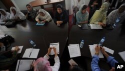 Afghan women meet to discuss their role in the country's advancement of peace, political, social and economic progress with U.S. Ambassador-at-Large for Global Women's Issues, Melanne Verveer.