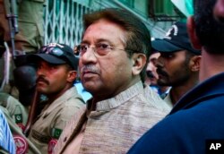 FILE - In this Saturday, April 20, 2013 file photo, Pakistan's former President and military ruler Pervez Musharraf arrives at an anti-terrorism court in Islamabad.
