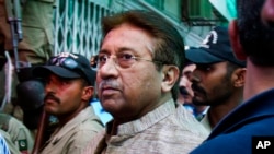 FILE - In this Saturday, April 20, 2013 file photo, Pakistan's former President and military ruler Pervez Musharraf arrives at an anti-terrorism court in Islamabad.