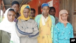 FILE - Teenage girls who have all been victims of abduction for marriage are seen, Sept. 8, 2004, in Arsi, eastern Ethiopia.