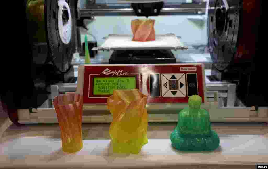 A 3D printer for consumers capable of creating multicolor objects is demonstrated at the opening event at the Consumer Electronics Show in Las Vegas January 4, 2016. The unit will be available later this year for $499, according to the company. 