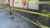 Una cinta de seguridad de la policía cubre el exterior de un restaurante tras un tiroteo entre narcotraficantes en Tulum, México, el 22 de octubre de 2021.