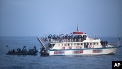 FILE - Israeli soldiers raid a ship as the navy intercepts a Gaza-bound aid flotilla in the Mediterranean Sea on May 31, 2010.