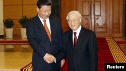 11月5日，中国国家主席习近平与越南共产党总书记阮富仲在越南河内会晤。