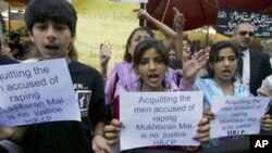 Members of a Pakistani civil society hold a protest against a supreme court decision regarding the 2002 rape case of Mukhtar Mai, April 23, 2011, in Karachi, Pakistan.
