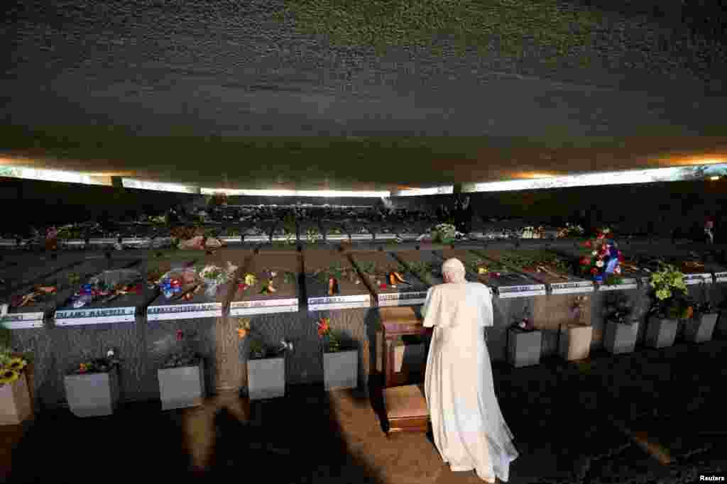Pope Benedict visits the Ardeatine Caves Memorial in Rome, Italy, March 27, 2011. 