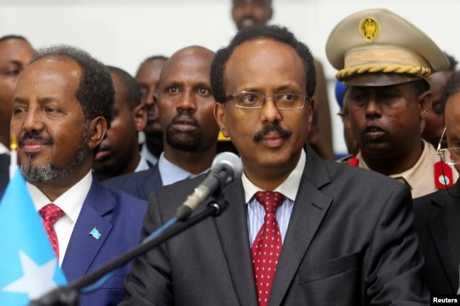 FILE - Somalia's President Mohamed Abdullahi Farmajo addresses lawmakers after his election victory in Mogadishu, Feb. 8, 2017. Mohamed was prime minister during the nation's 2011 famine disaster.