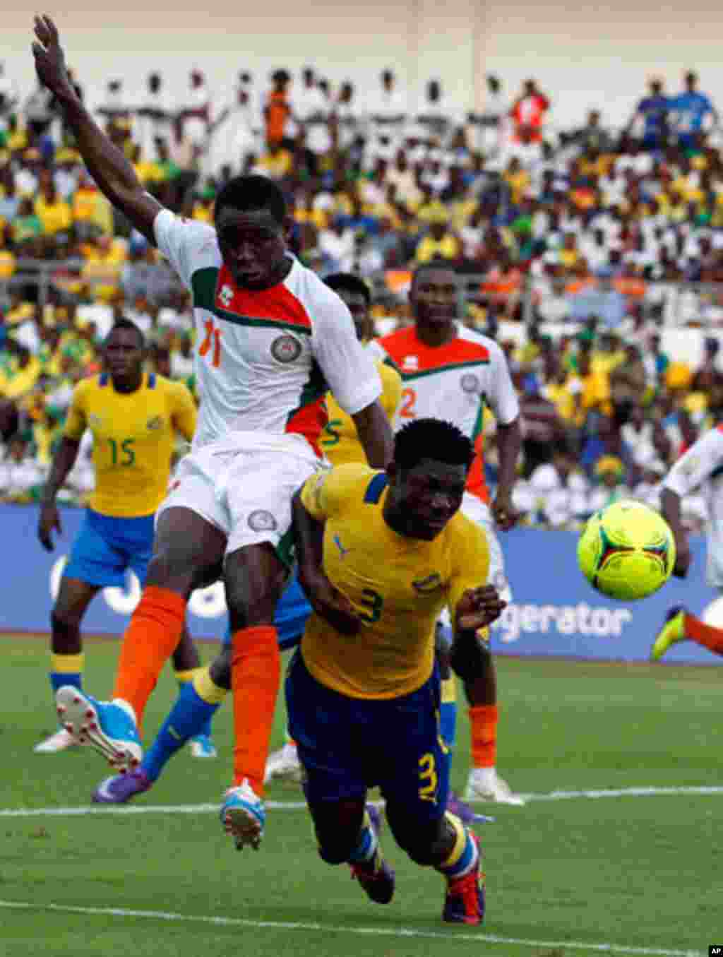 Gabon's Edmond is challenged by Niger's Issoufou during their African Cup of Nations soccer match in Libreville
