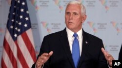 FILE - U.S. Vice President Mike Pence speaks during a news conference at the Summit of the Americas in Lima, Peru, April 14, 2018.