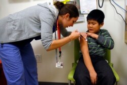 Вакцинація від сезонного грипу, Бостон, 2013, Reuters